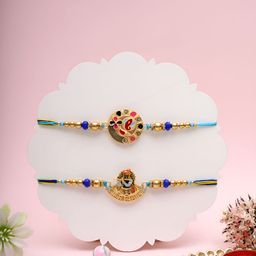 Myntra Elegant Homes Set Of 2 Thread Rakhis With Greeting Card & Roli Chawal-54