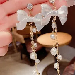 Celestique Artificial Stones Studded & Pearls Beaded Korean Bow Shaped Drop Earrings-picture-38