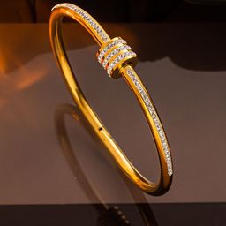 GOLDIWALA Stainless Steel Gold-Plated Cubic Zirconia Studded Bangle-Style Bracelet-19