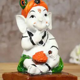 Decorative Lord Ganesha Eating Ladoo in Lord Krishna Avatar-27