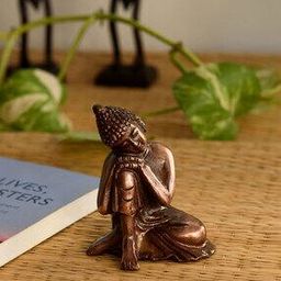 Metal Resting Buddha on Knee-17