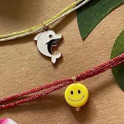 Tie-Up Set of 2 Gold Plated Rakhi-image-1