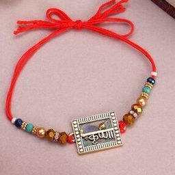 Gold-Plated Krishna Shaped Stone-Studded Rakhi with Roli Chawal-image-65