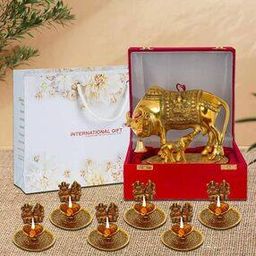 Metal Kamdhenu Cow Idol with Laxmi Ganesh Diyas-26