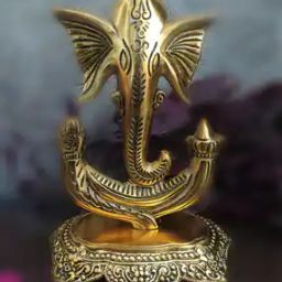 navyaksh Ganesh Statue with Diya Showpiece-picture-49