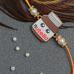The Magic Wand Brown & White Pearls beaded Nutella Rakhi-image-96