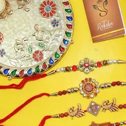 CraftVatika Set Of 7 Rakhi With Pooja Set & Card With Roli Chawal image 1
