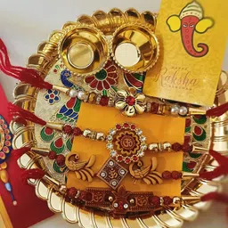 CraftVatika Set Of 7 Rakhi With Pooja Set & Card With Roli Chawal image 2
