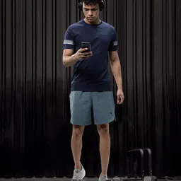 Puma Men Grey Solid Mid-Rise STUDIO ULTRAMOVE Sports Sustainable Shorts-image-78