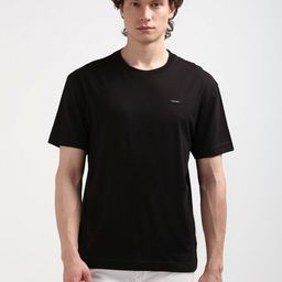 Calvin Klein Jeans Men Solid Round Neck Pure Cotton Relaxed Fit Tshirt-image-43