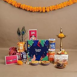 Delights Rakhi Gift Box for Brother – 11 Items with Dry Fruit Barfi (Chocolate Cashew, Cranberry Almond, Cocoa Orange), Almond Chocolate, Millet Mixes, Rakhi, Roli Chawal, Potli & more-image-26