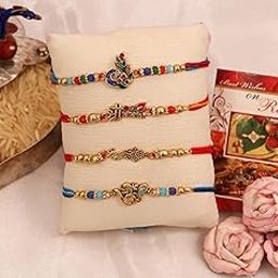 Chocozone Set of 4 Multicolor Ohm, Flute, Floral & Peacock Designer Rakhi with Roli Chawal & Card - Rakhi for Bhaiya & Bhai Rakhi Set for Brother-30