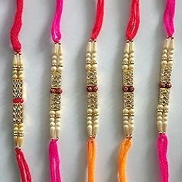 Divine Designer Pack of 14 Random Rakhi, 1 Pack Roli Chawal, 12 Dora and 2 Fancy-image-83