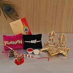 Collectible India Rakhi Gift Combo of Metal Golden Laxmi Ganesh Showpiece Oil Lamp Diya, Bhai Rakhi, Lumba Rakhi and Greeting Card-image-1