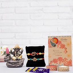 ARCHIES Great Rudraksh Rakhi for Brother Rakshabandhan Combo of 1 Rakhi, 1 Ganesh Laxmi Coin With 1 Roli&Chawal-10gm, 1 Exotic Assorted Chocolates-30 gms(Dates and Almonds) & Greeting Card (Pack of 5)-2