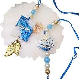 Traditional Bhaiya Bhabhi Rakhi Set with Blue Glitter, Pearl Beads, Golden Leaf Charm-image-93