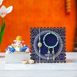 Dreamica Bhaiya Bhabhi Rakhi Combo | Lord Ganesha Idol with Lumba Rakhi Pair, Greeting Card & Tilak Set | Raksha Bandhan Gift Hamper for Couples (Rakhi-185)-image-95