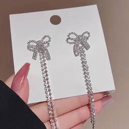 VAGHBHATT Silver-Plated Rhinestone Studded Bow Design Drop Earrings image 4