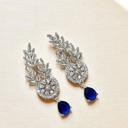 The Pari Rhodium-Plated American Diamond Studded Teardrop Shaped Drop Earrings-image-81