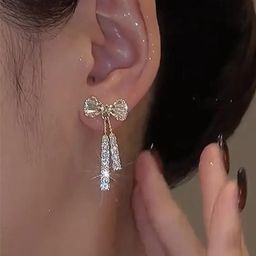 ONUYX Bow Shaped Studs Earrings-50