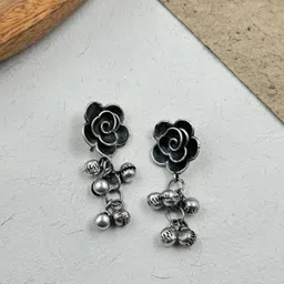 NAMAN ARTS Silver-Plated Floral Shaped Oxidised Drop Earrings-15