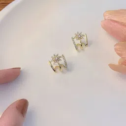 VAGHBHATT Gold-Plated Cubic Zirconia Studded Dual-Band Floral Shaped Studs image 3