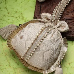 Anekaant Embroidered Tasselled Potli Clutch-53