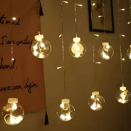 ENORMITY Yellow Cylindrical Shape String Lights image 1