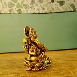 Aakrati Yellow Religious Idol Showpiece-image-32
