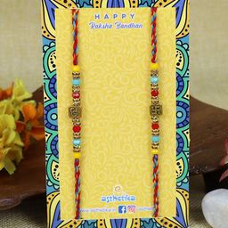 Asthetika Set Of 2 Om Swastik Crystal Thread Rakhis With Roli Chawal image 2