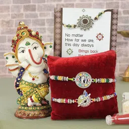 TIED RIBBONS Set of 2 Premium Rakhi With Ganesh Idol Greeting Crad & Tikka Combo Set-4