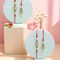 ADIVA Set Of 2 Gold-Plated Beaded Thread Lumba Rakhi Roli Chawal Chandan & Meshrei Card-image-1