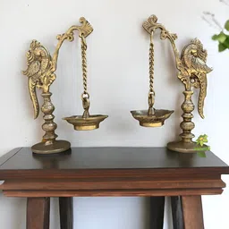 Aakrati Gold Toned 2 Pieces Brass Peacock Patterned Diya Stands-image-35