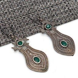 Ozanoo Brass-Plated Teardrop Shaped Stone Studded Drop Earrings-14