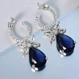 The Pari Rhodium-Plated American Diamond Studded Teardrop Shaped Drop Earrings-image-89