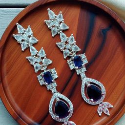 The Pari Rhodium-Plated American Diamond Studded Teardrop Shaped Drop Earrings-image-80