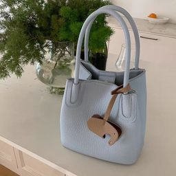 CORSICA Textured Swagger Handheld Bag-image-65