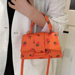 StyleCast Printed Bucket Handheld Bag with Tasselled image 4