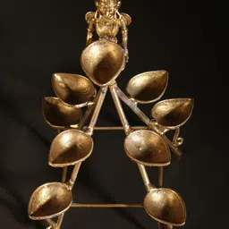 Exotic India Textured  Tribal Deep Lakshmi with 9 Wicks Lamp-image-99