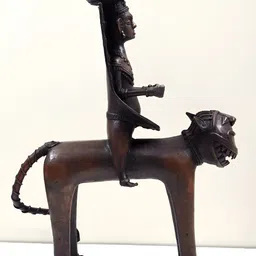 Exotic India Brown Large Dhokra Art Tribal Man Sitting on Lion Brass Figurine Showpiece-image-48