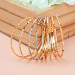 Zeraki Jewels Set Of 8 Gold Plated Textured Sitara Bangles-image-10