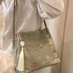 StyleCast x Revolte Printed Structured Sling Bag image 2