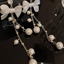 Celestique Pearls Beaded Korean Tasselled Bow Shaped Drop Earrings-picture-0