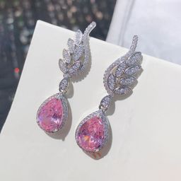 Designs & You Silver-Plated American Diamond Studded Contemporary Drop Earrings-image-61