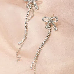 VAGHBHATT Silver-Plated Rhinestone Studded Bow Design Drop Earrings-3