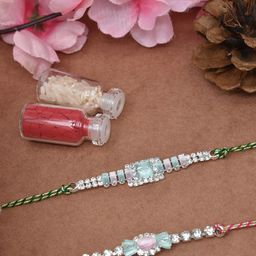 MEIRA JEWELLERY Set Of 2 Stones Studded Thread Rakhi With Roli Rice & Greeting Card-image-35