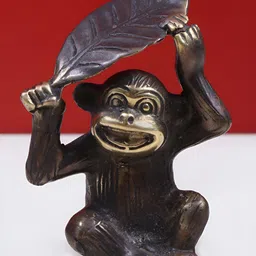 Exotic India Black & Gold Toned Monkey Holding a Leaf Over Its Head Brass Showpiece-image-48