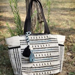 Anekaant Textured Structured Handheld Bag with Tasselled image 1