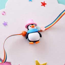 Aapno Rajasthan Chill Vibes with Winter-Ready Penguin Rakhi with Roli Rice & Greeting Card-image-66