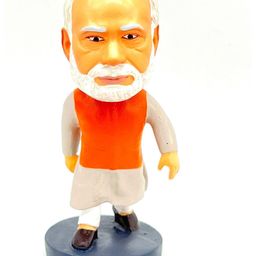 Awestuffs Orange & White Shri Narendra Modi Showpiece-image-81